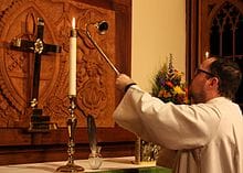 Acolyte serving at Mass